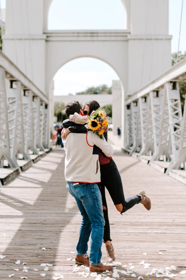Tiffani and Alex hugging after proposal