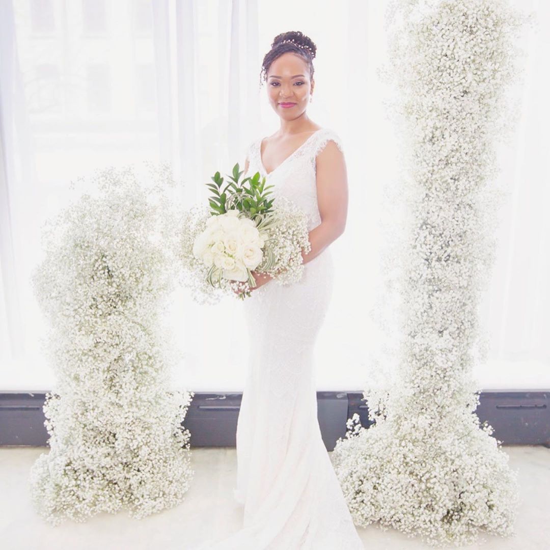 Solo shot of bride holding bouquet