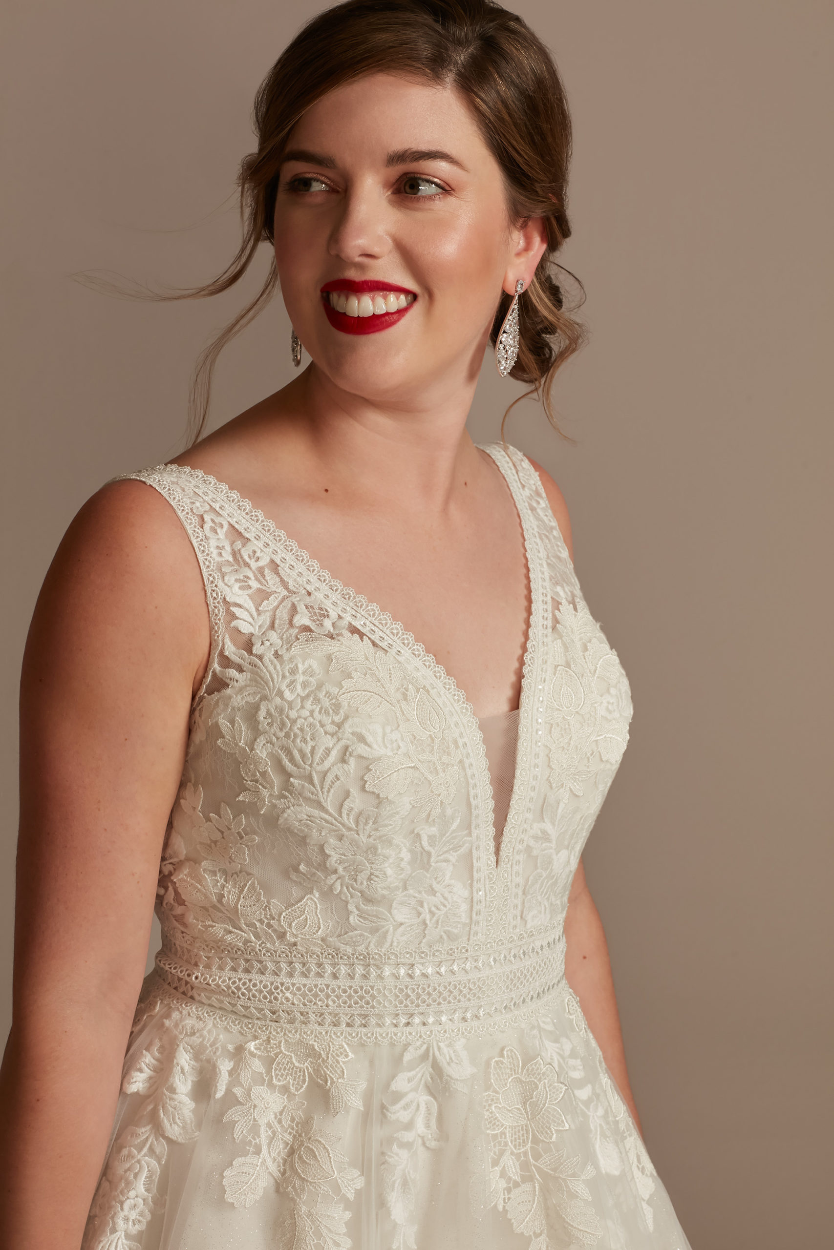 bride wearing ethereal Embroidered V-Neck Wedding Dress with Tulle Skirt
