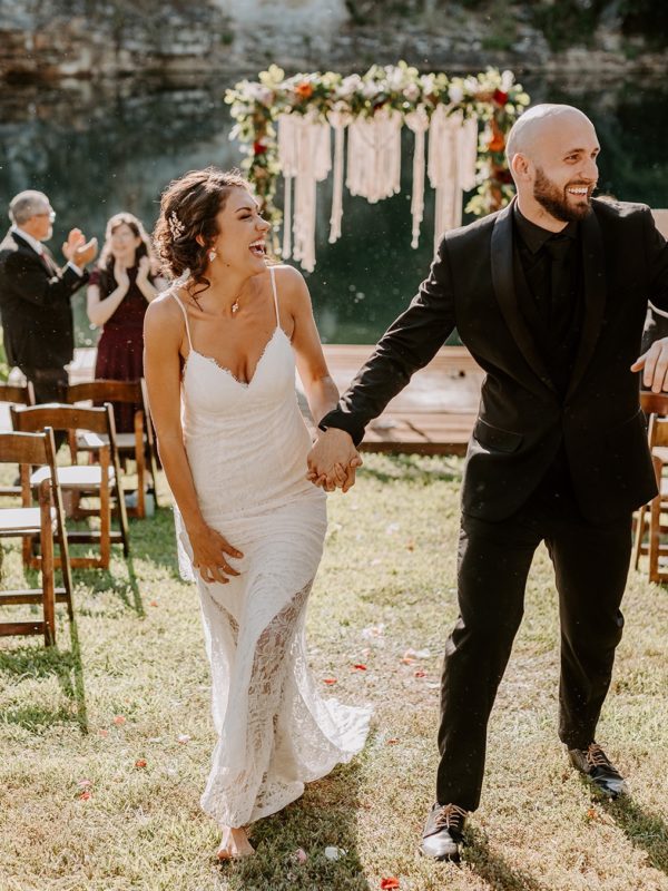 couple walking up the aisle at their micro wedding