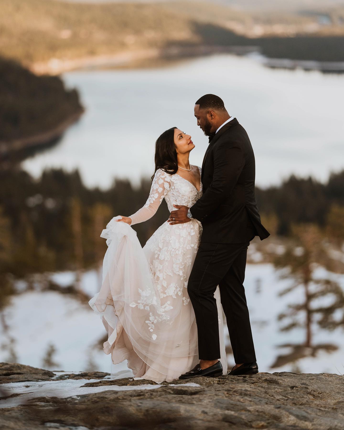 Winter bride wearing a long sleeve wedding dress