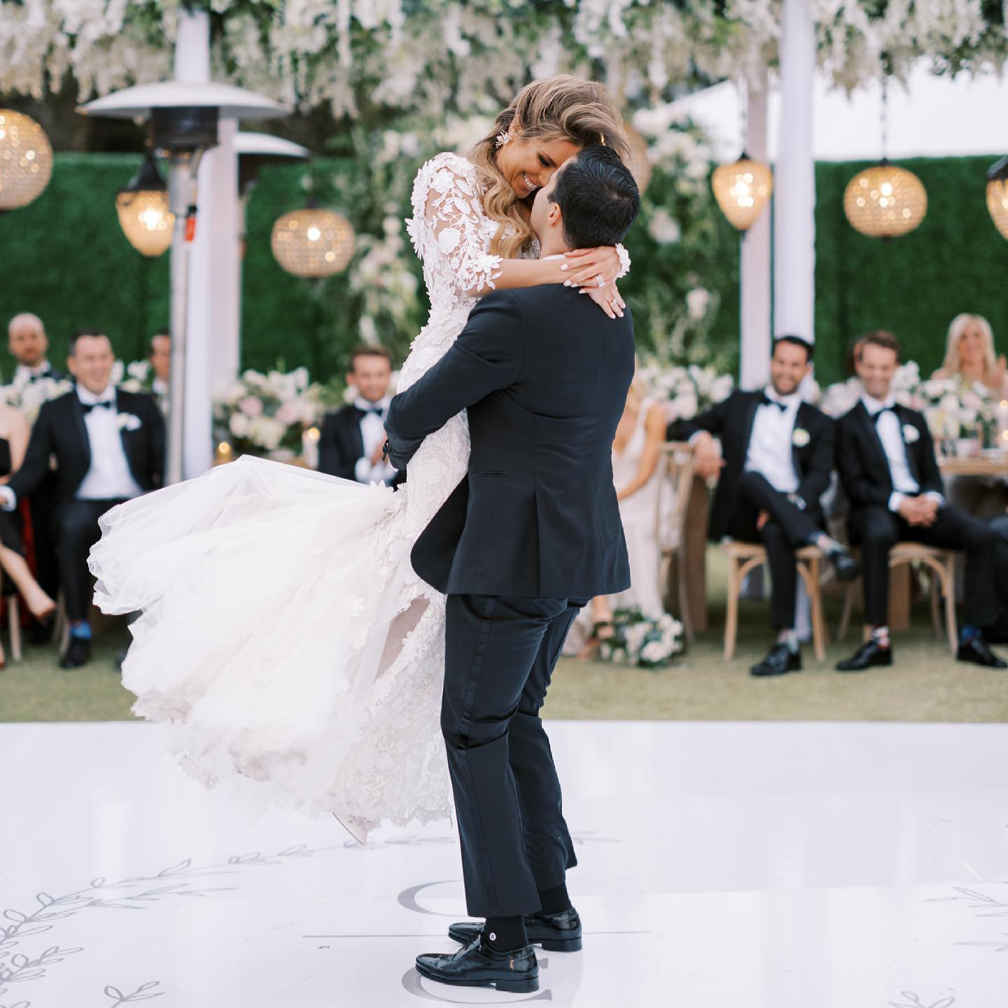 bride and groom dancing