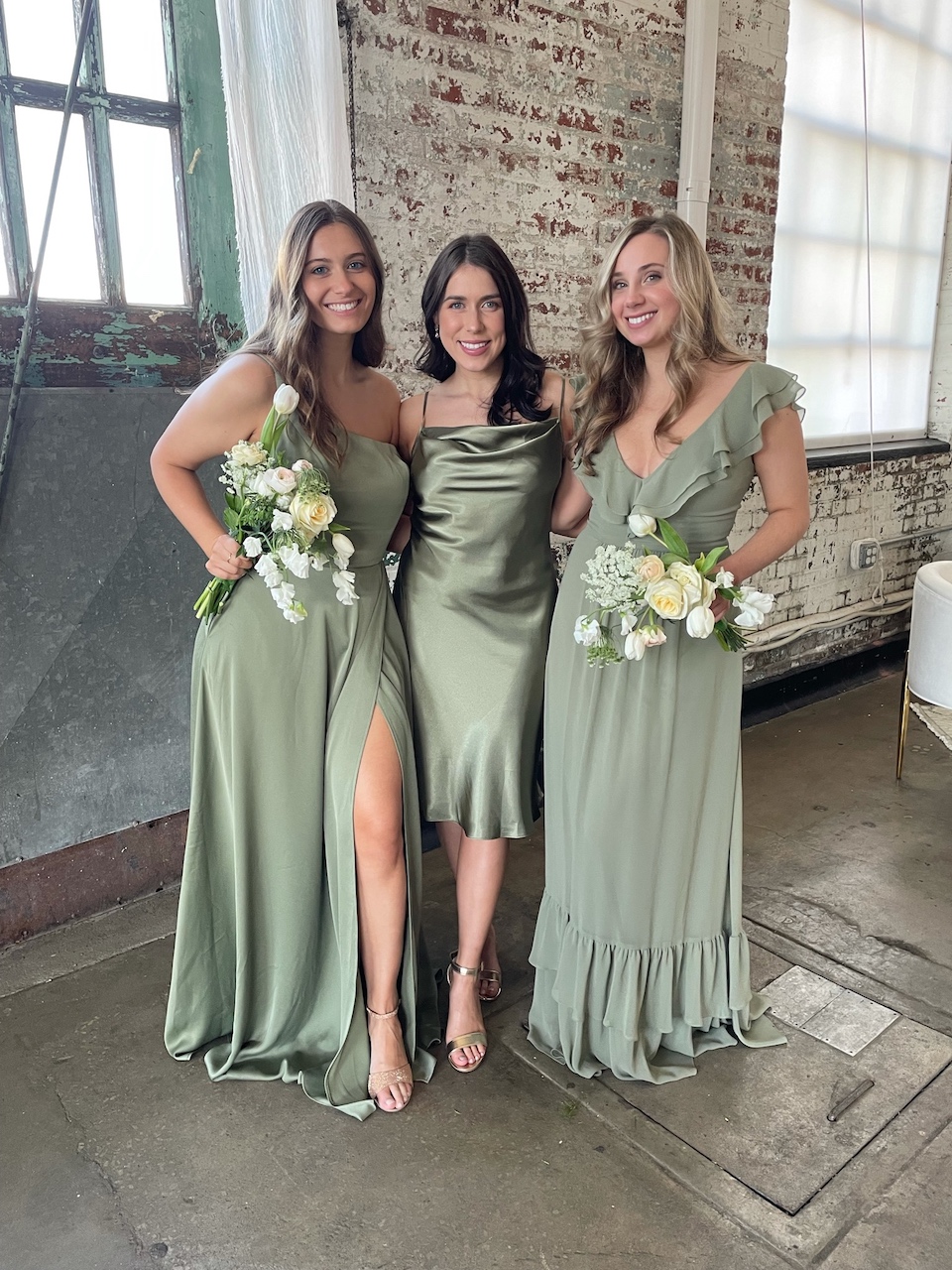 3 bridesmaids in light green bridesmaid dresses