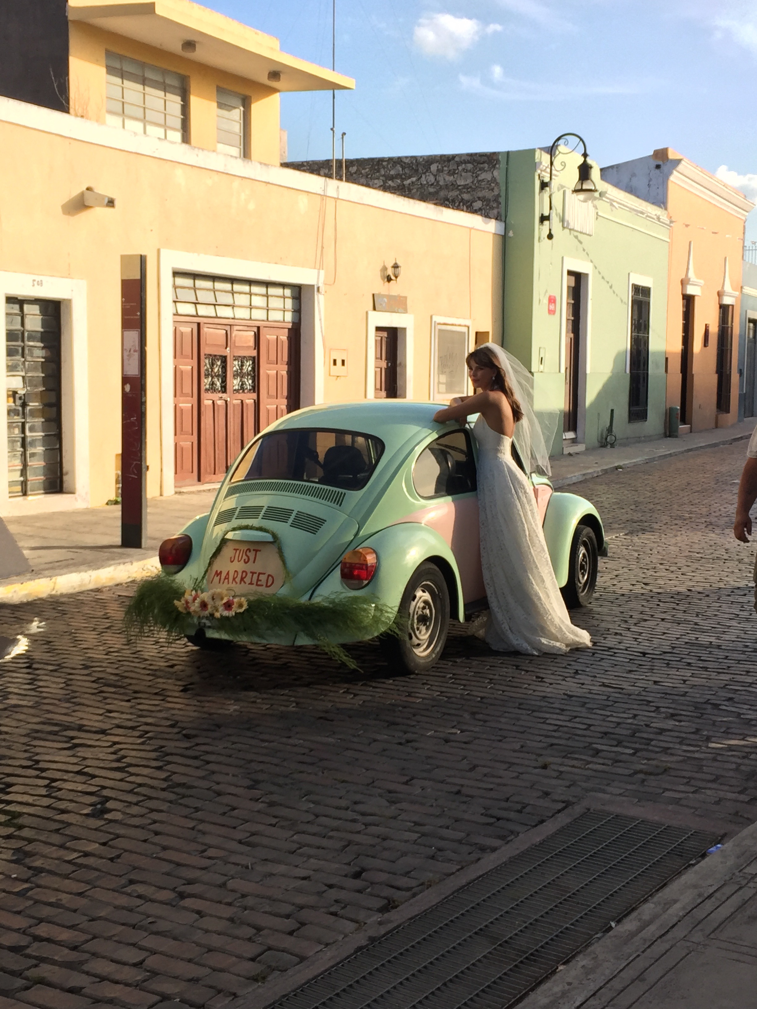 How fun is this pink and green vintage Volkswagen Beetle? See more on the David's Bridal blog - www.davidsbridal.com/blog.