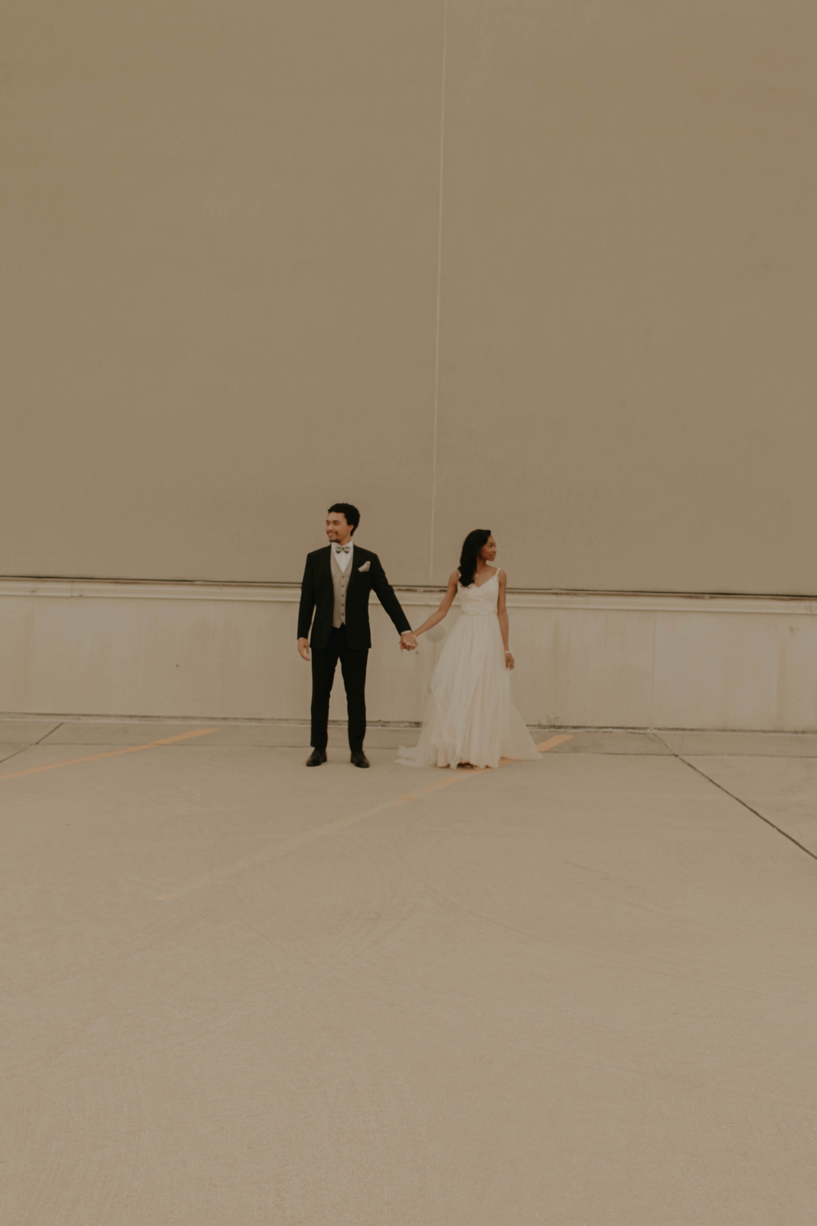 Quiana and Mark Holding Hands