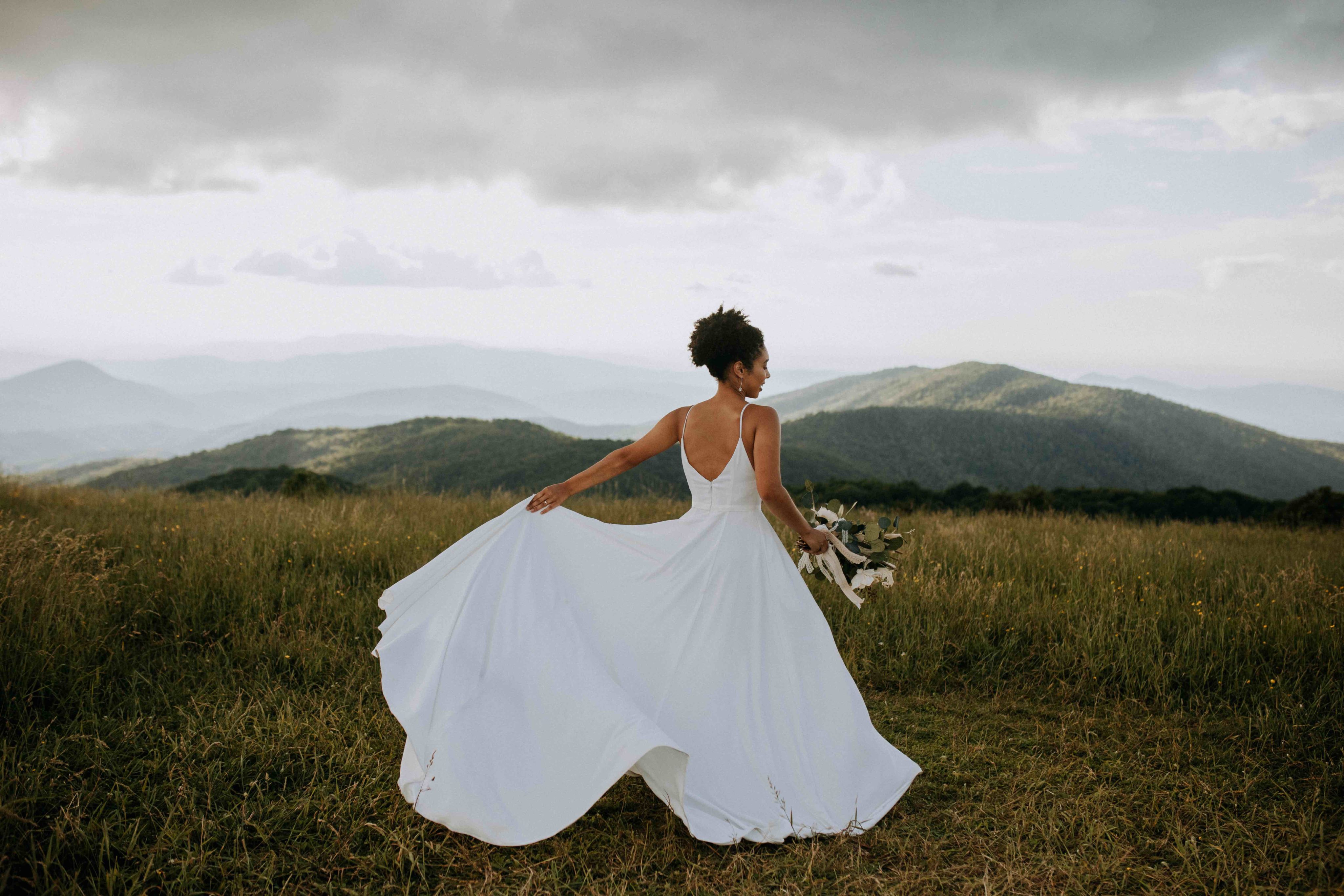 Brida twirling in wedding dress