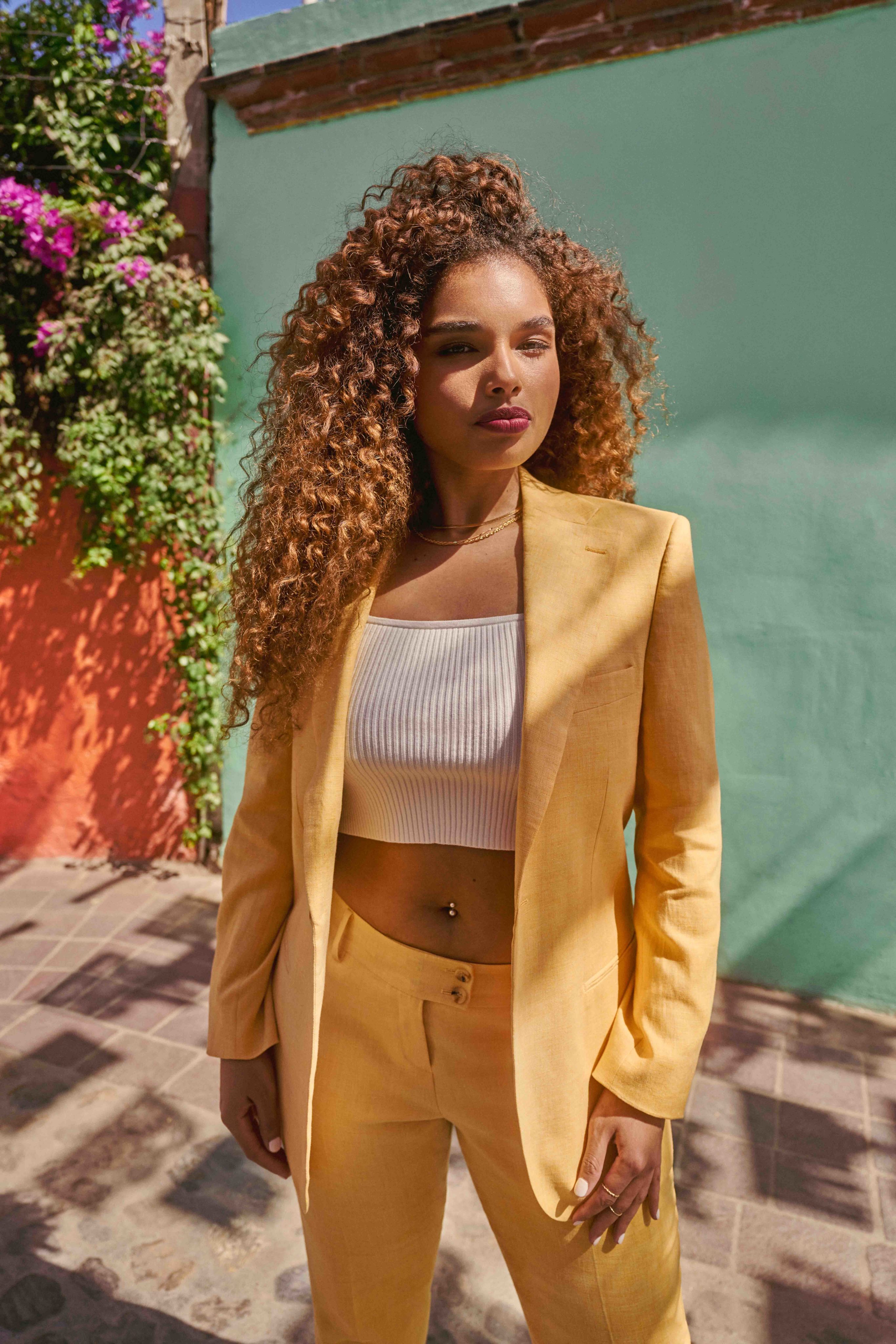 woman in yellow suit