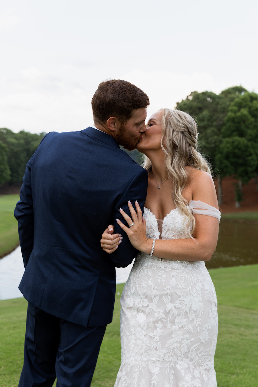 bride and groom kissing