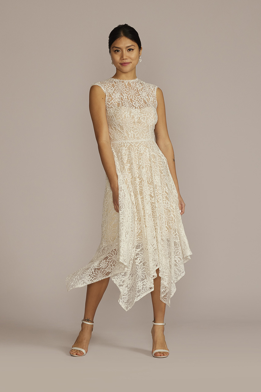 model in High-Neck Lace Dress with Asymmetrical Skirt 