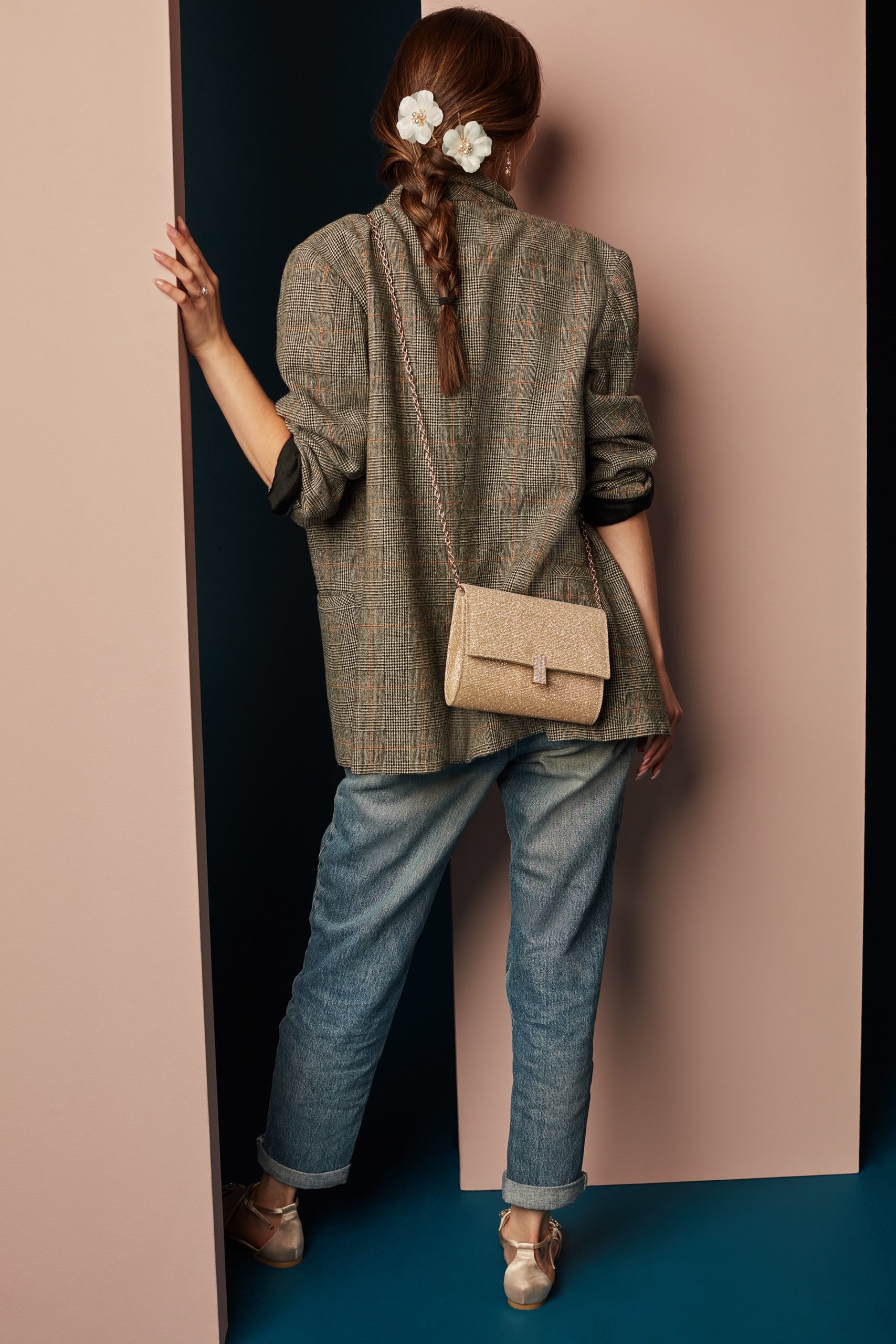 girl wearing blazer and jeans as a way to restyle a wedding day look 