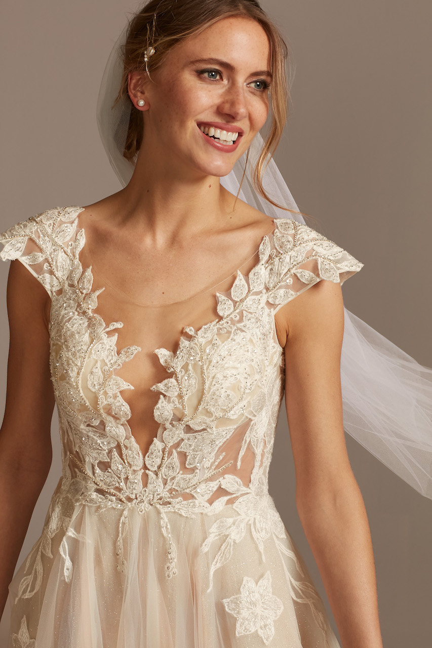 bride wearing ethereal Illusion Cap Sleeve Lace Appliqued Wedding Dress