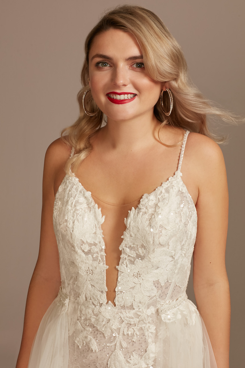 bride wearing Sequin Applique ethereal Wedding Dress with Removable Train