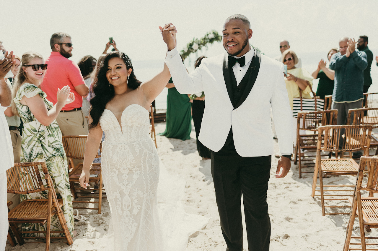 bride and groom celebrating at tropical wedding in florida